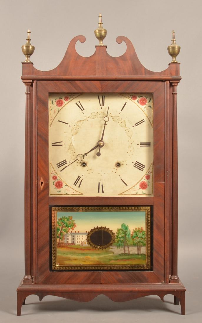 Eli Terry & Sons Mahogany Pillar and Scroll Case Clock.: Eli Terry & Sons, Plymouth, CT, Mahogany Pillar and Scroll Case Clock. Brass urn finials, painted wood dial with village scene reserve, reverse painted tablet with three story mansion. 31-1/2"h. x 16-