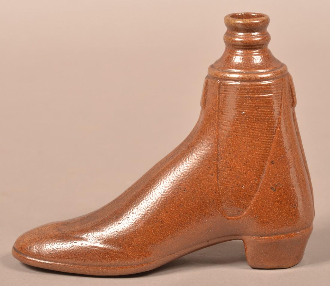 Brown Glazed Stoneware Shoe Form Flask. (1 of 3)