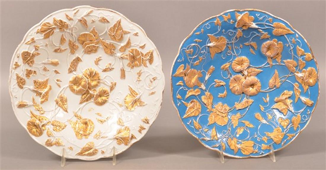Two Meissen Porcelain Morning Glory Bowls.: Two Meissen Porcelain Morning Glory Pattern Bowls. Embossed and gold painted with scalloped edge. Both with blue cross sword mark. One blue ground one white ground. 11" and 11-1/4" diam. Condition: Ve