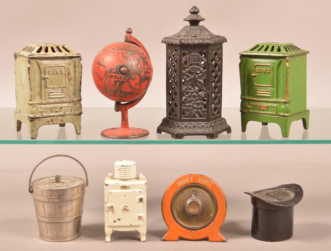 Eight Various Cast Metal Still Banks. (1 of 2)