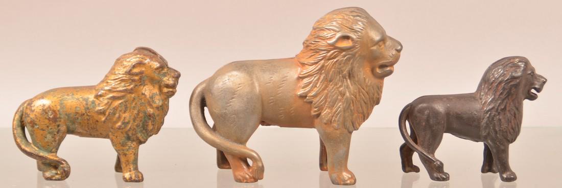 Three Cast Iron Lion Still Banks. (1 of 2)