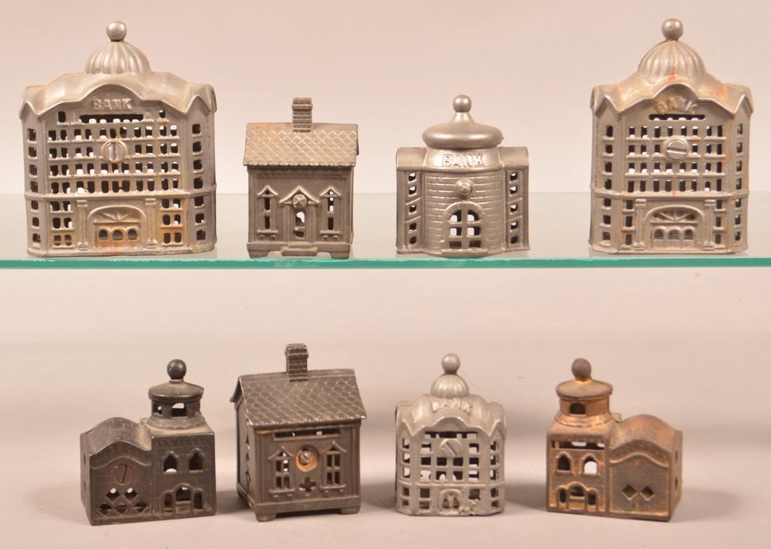 Eight Various Cast Metal Building Still Banks. (1 of 2)