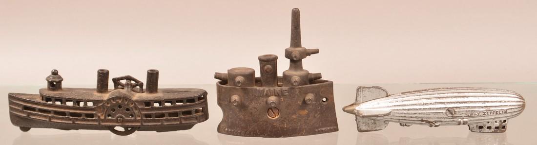 Three Antique/Vintage Cast Iron Still Banks. (1 of 2)