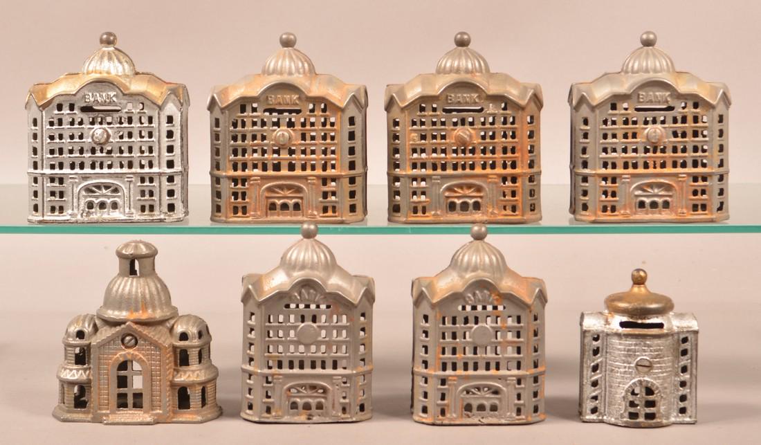 Eight Various Cast Iron Building Still Banks. (1 of 2)