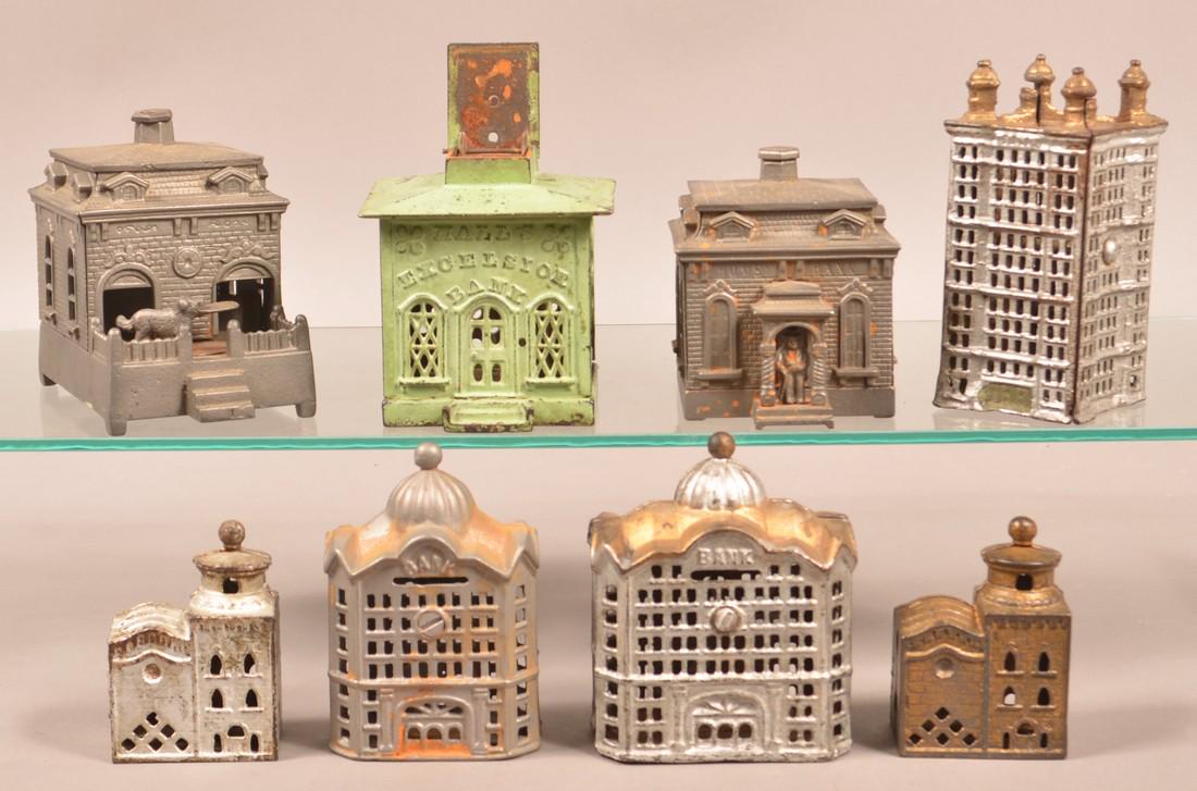 Eight Various Cast Iron Building Still Banks. (1 of 3)