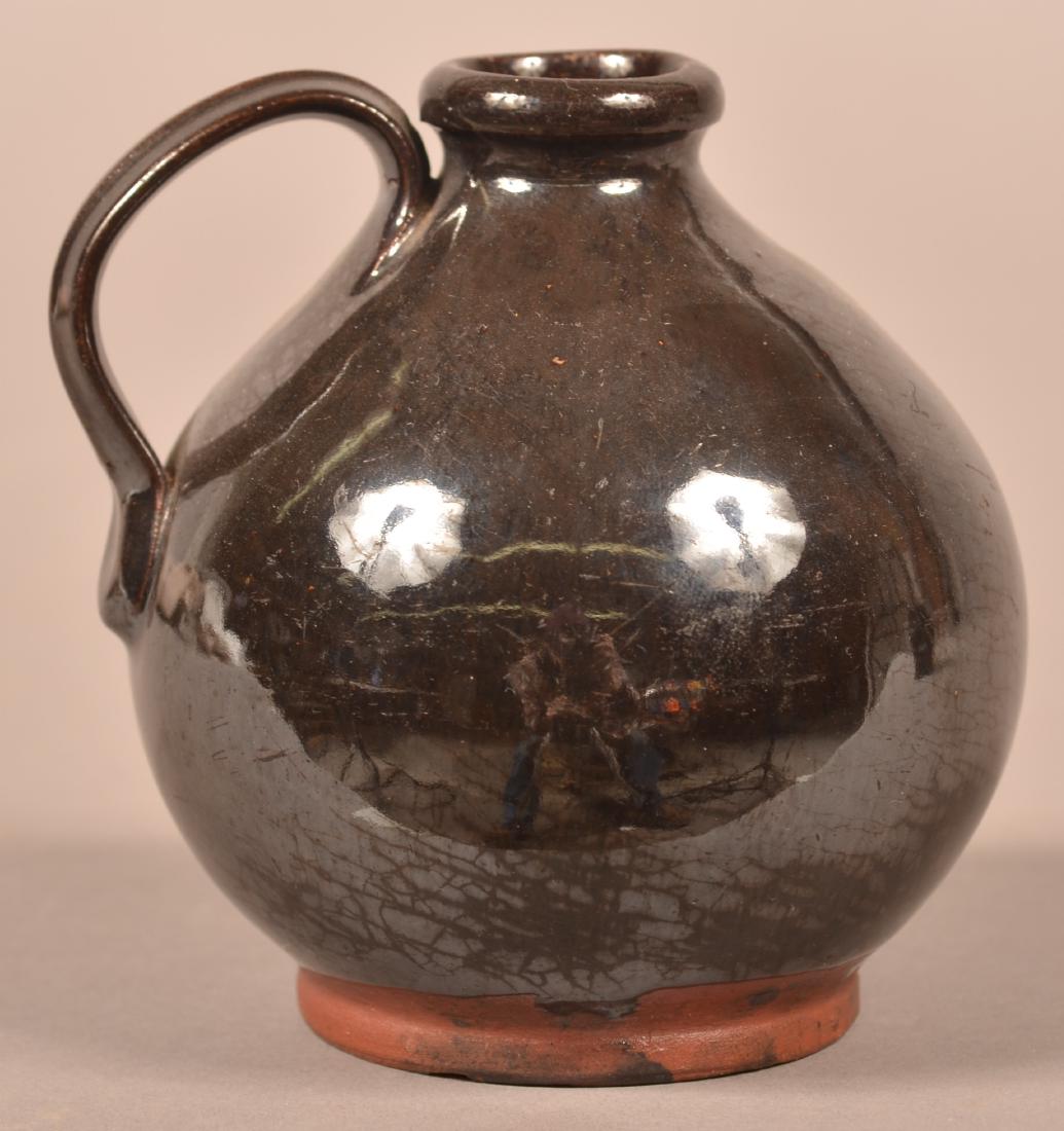 Manganese Glazed Redware Miniature Jug. (1 of 3)