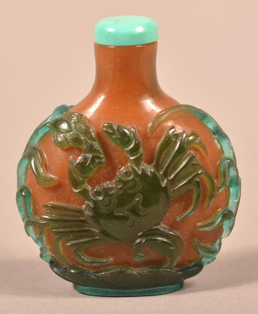 Green & Amber Colored Peking Glass Snuff Bottle. (1 of 3)