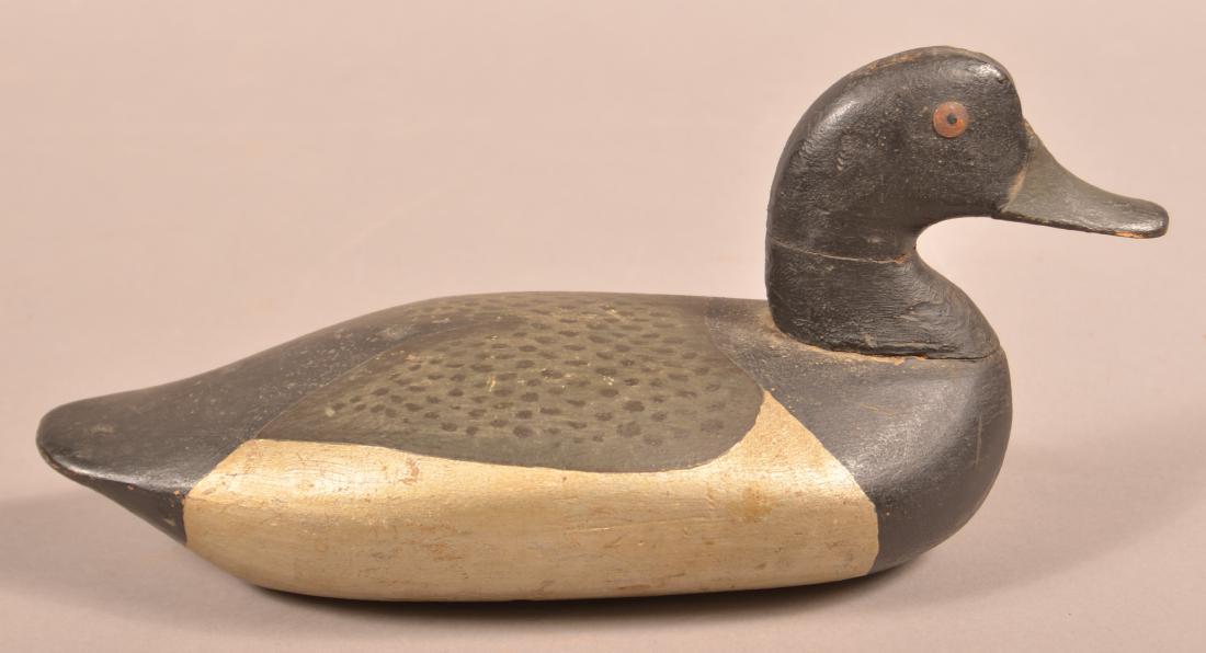Carved and Painted Blue Bill Drake Decoy. (1 of 3)
