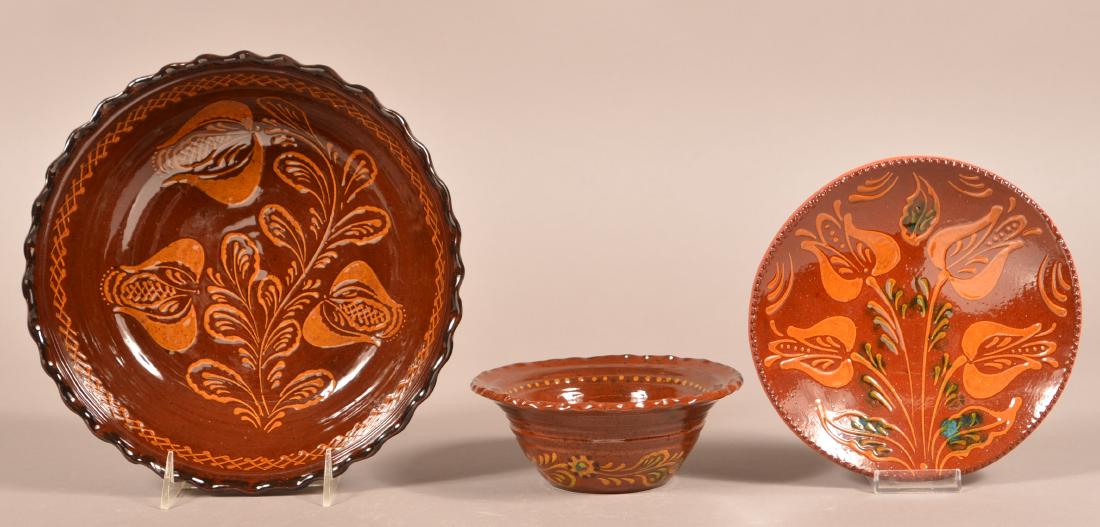 3 Pieces of Floral Slip Decorated Foltz Redware. (1 of 2)