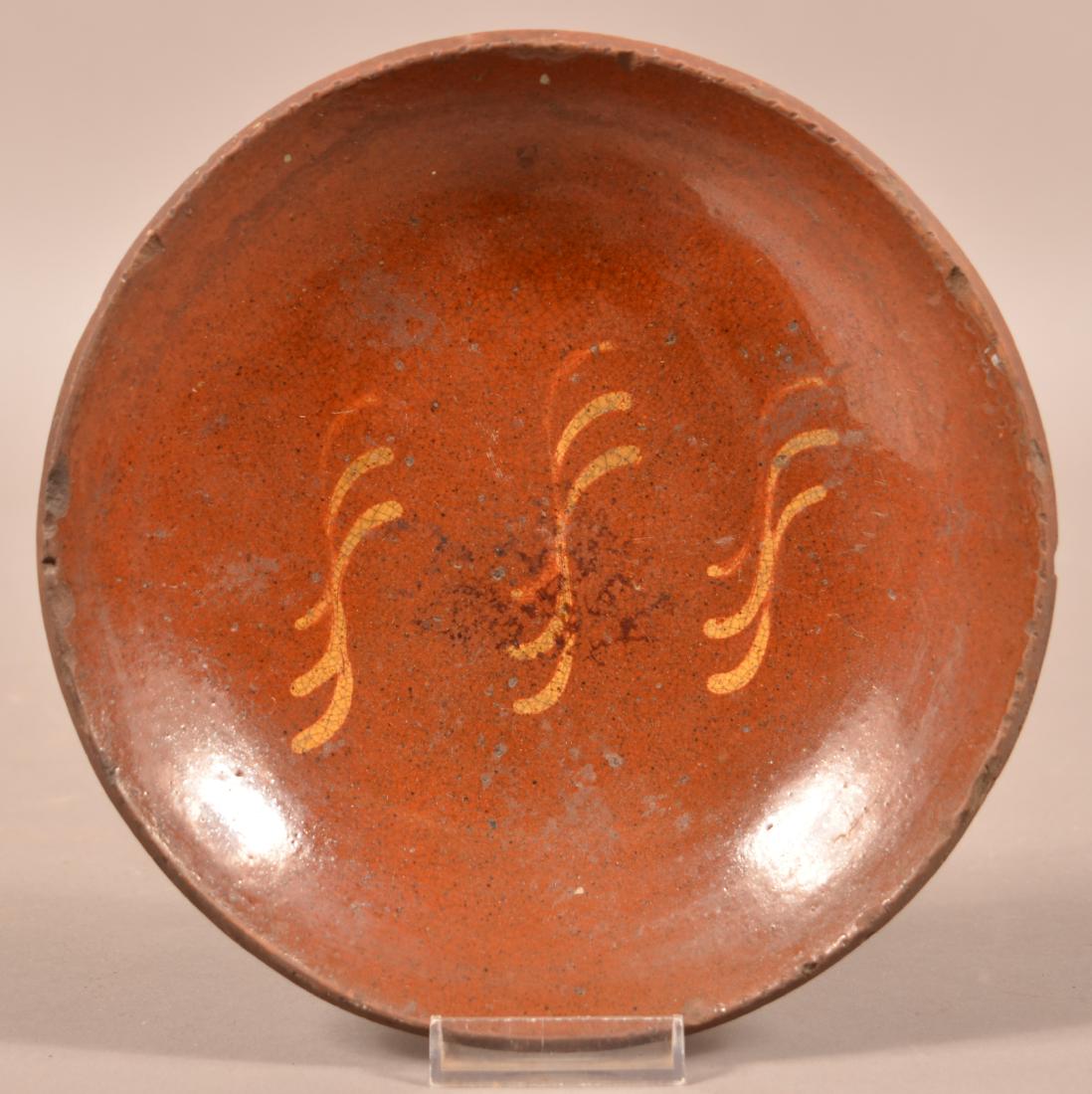 Redware Yellow Slip Decorated Plate. (1 of 2)