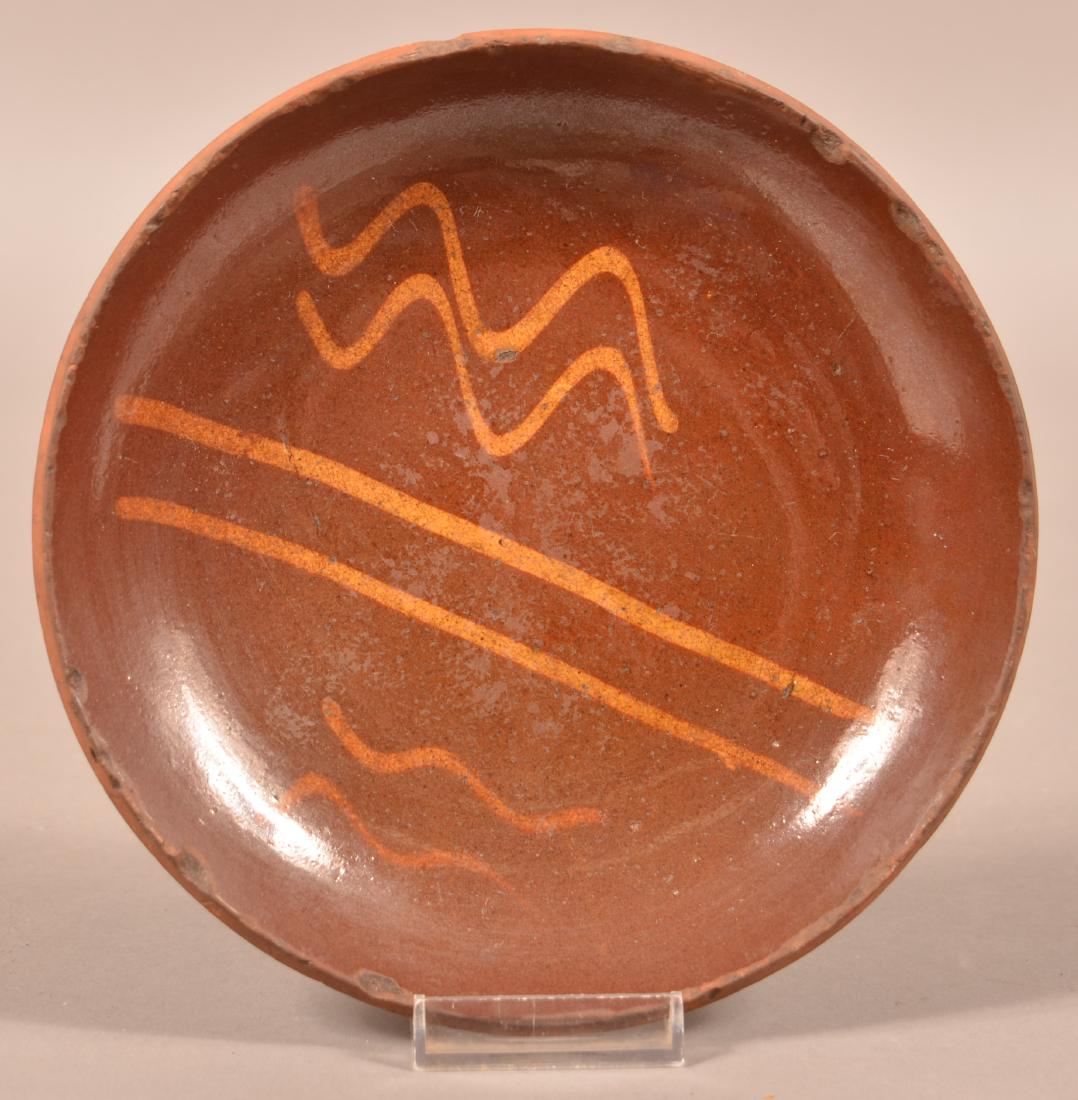 Redware Yellow Slip Decorated Plate. (1 of 2)