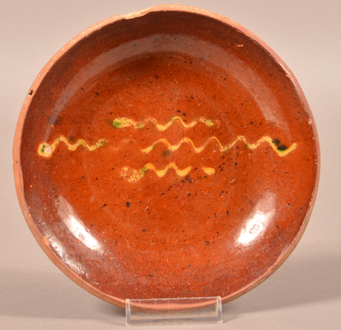 Redware Yellow Slip Decorated Plate. (1 of 2)