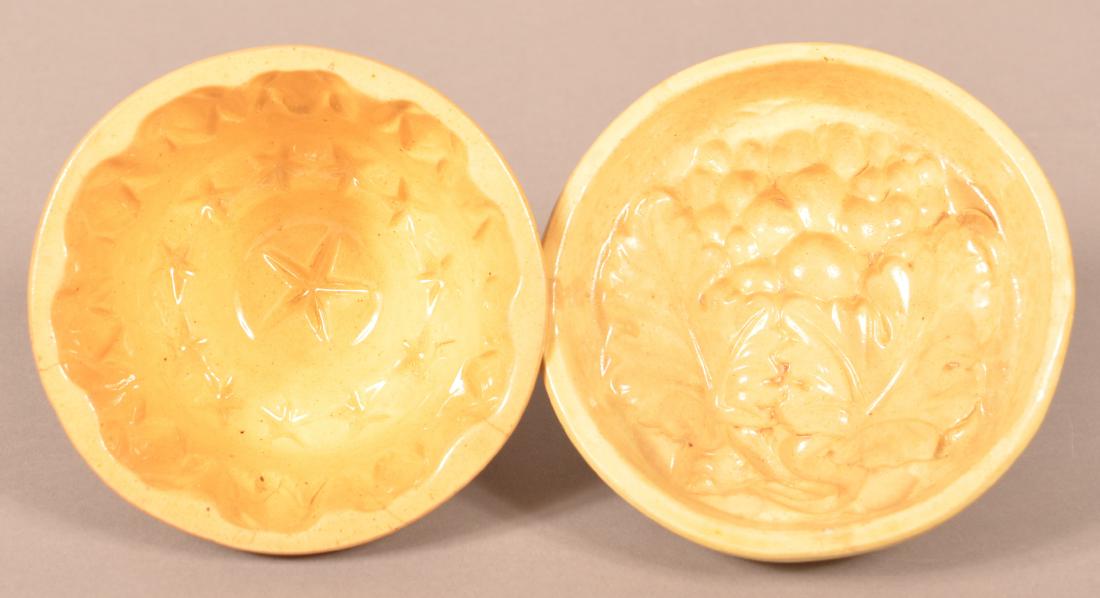 2 Antique Yellowware Round Molds. (1 of 3)