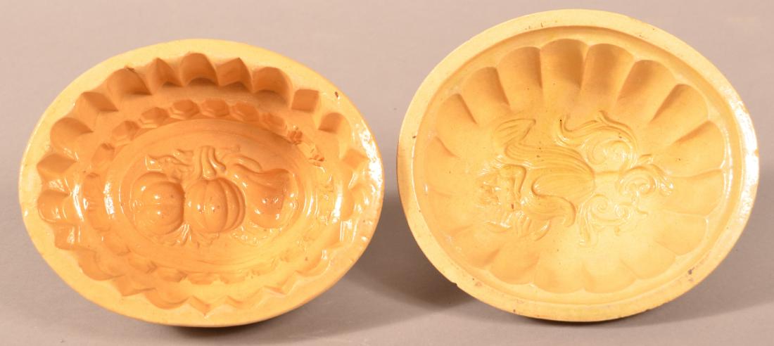2 Antique Yellowware Oval Molds. (1 of 3)