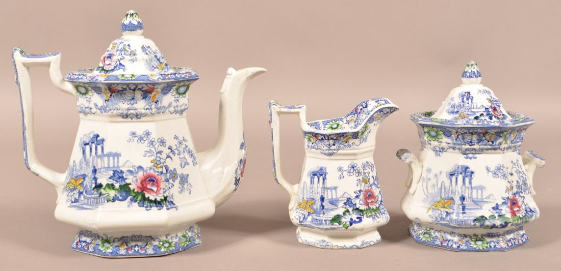 Cleopatra Pattern Ironstone China Coffee Set.: Blue Transfer Cleopatra Pattern Ironstone China Three Piece Coffee Set. Coffee pot measures 9-1/2"h. Condition: Very good, cream pitcher has a tiny pin nip on spout.