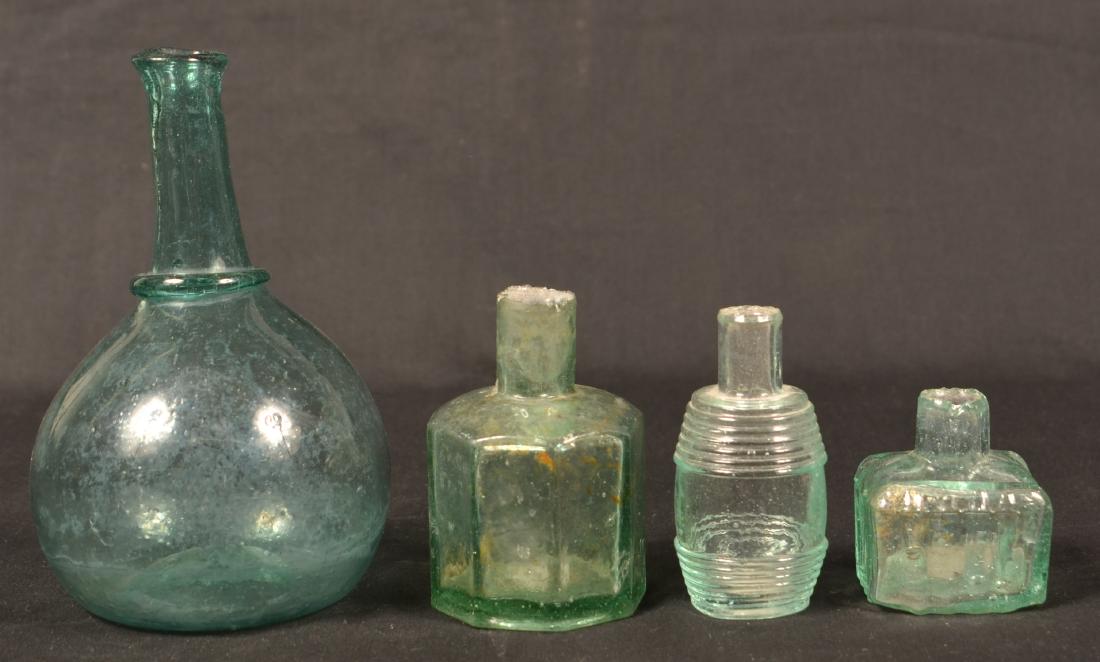 Four Various Blown Glass Bottles. (1 of 3)