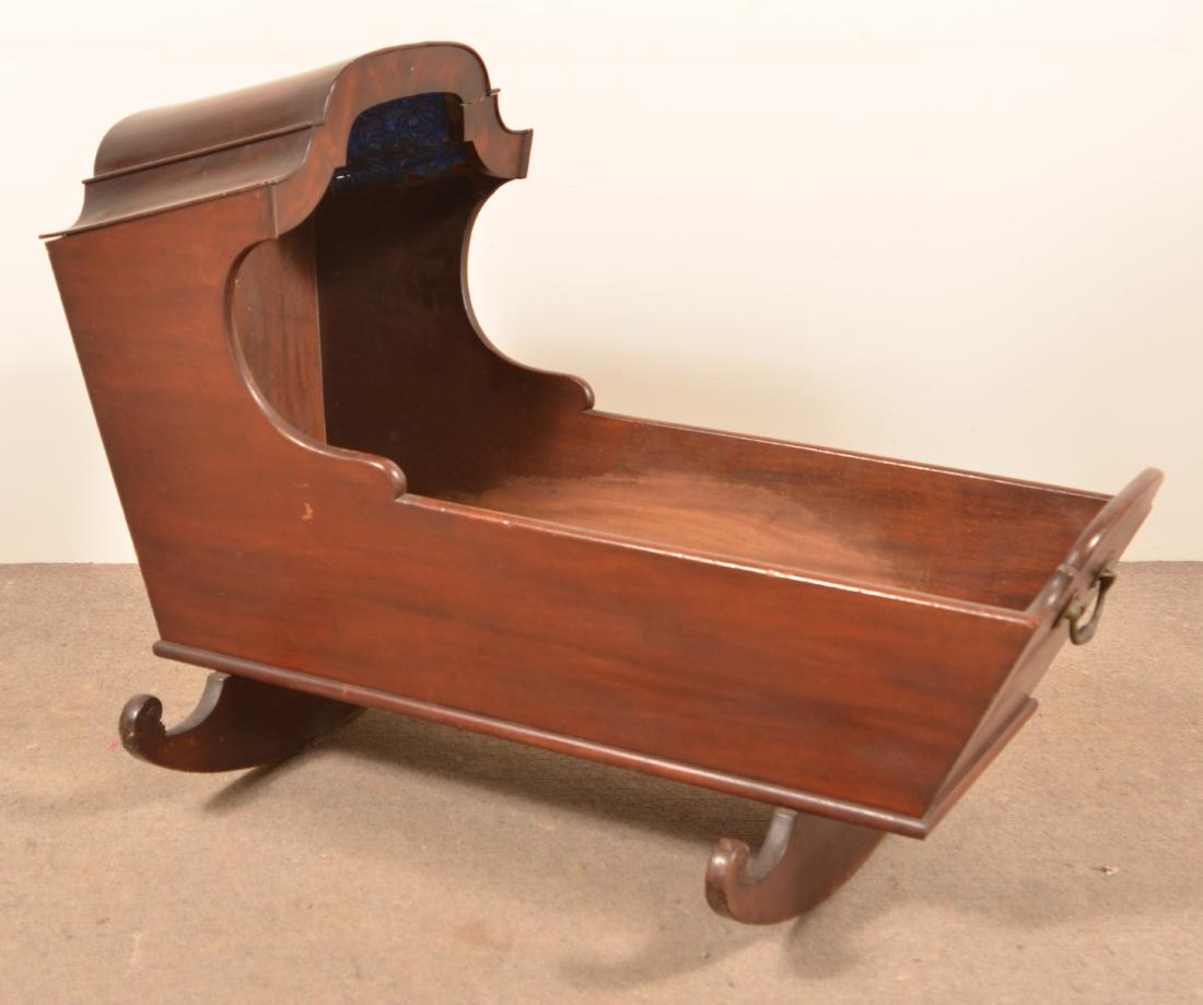 PA Mahogany Hooded Rocking Cradle.: PA Mahogany Hooded Rocking Cradle. 30-1/2"h. x 39"l. Condition: Good with wear and repair.