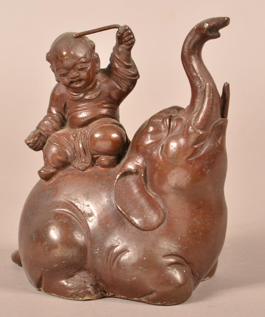 Japanese Bronze of a Boy Seated on an Elephant. (1 of 3)