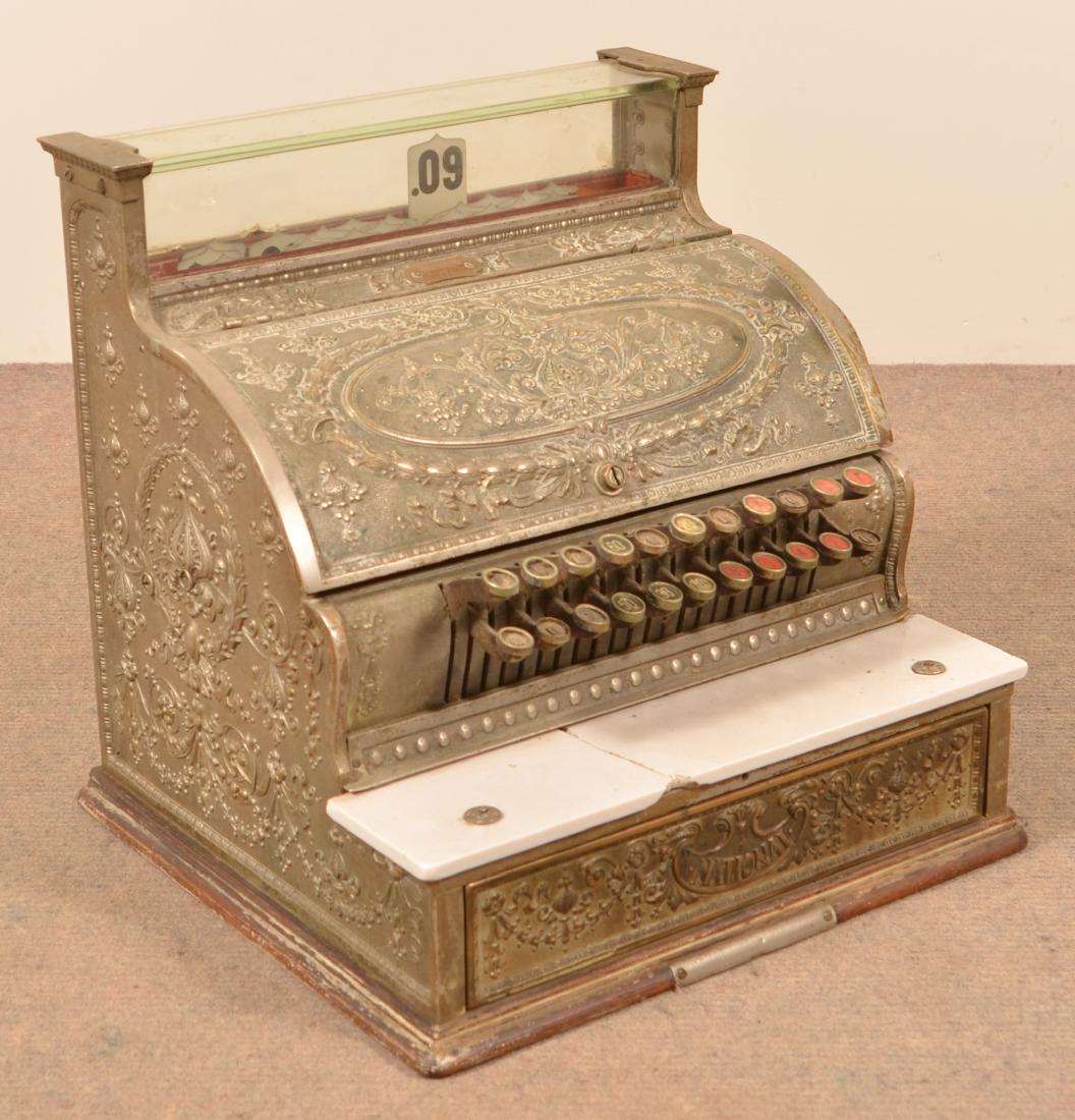National Cash Register Model 336.: National Cash Register Model 336. Serial #S143908M. Nickle plated brass case.17"h. x 19"w. x 16"d. Condition: Good with use wear, marble coin shelf is cracked. No marquee.