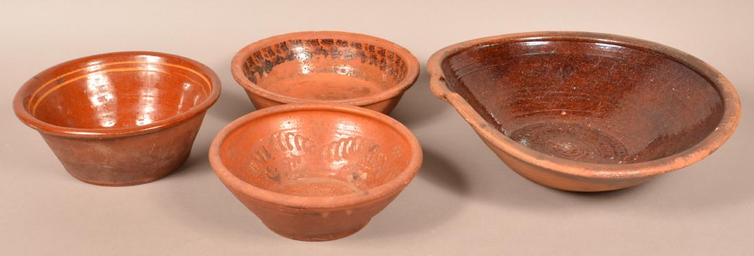 Four 19th Century Redware Bowls. (1 of 2)