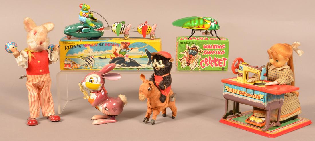 Six Various Wind-up and Battery Op Toys. (1 of 2)