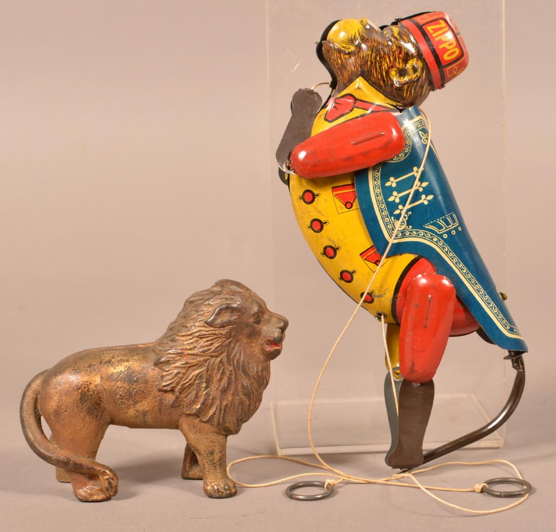 Lion Still Bank and Zippo Tin Lithograph Climbing Toy. (1 of 4)