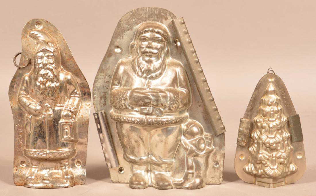 Vintage santa chocolate mold candy hanging christmas ornament Three Christmas Related Metal Chocolate Molds.