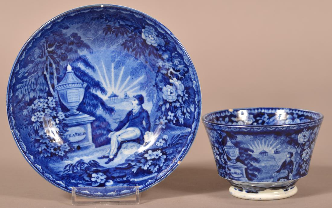 Historical Staffordshire Blue Transfer Cup and Saucer.: Historical Staffordshire Blue Transfer China Cup and Saucer. Lafayette at the Tomb of Franklin. Saucer measures 5-7/8" diam. Condition: Good with a few small edge chips.
