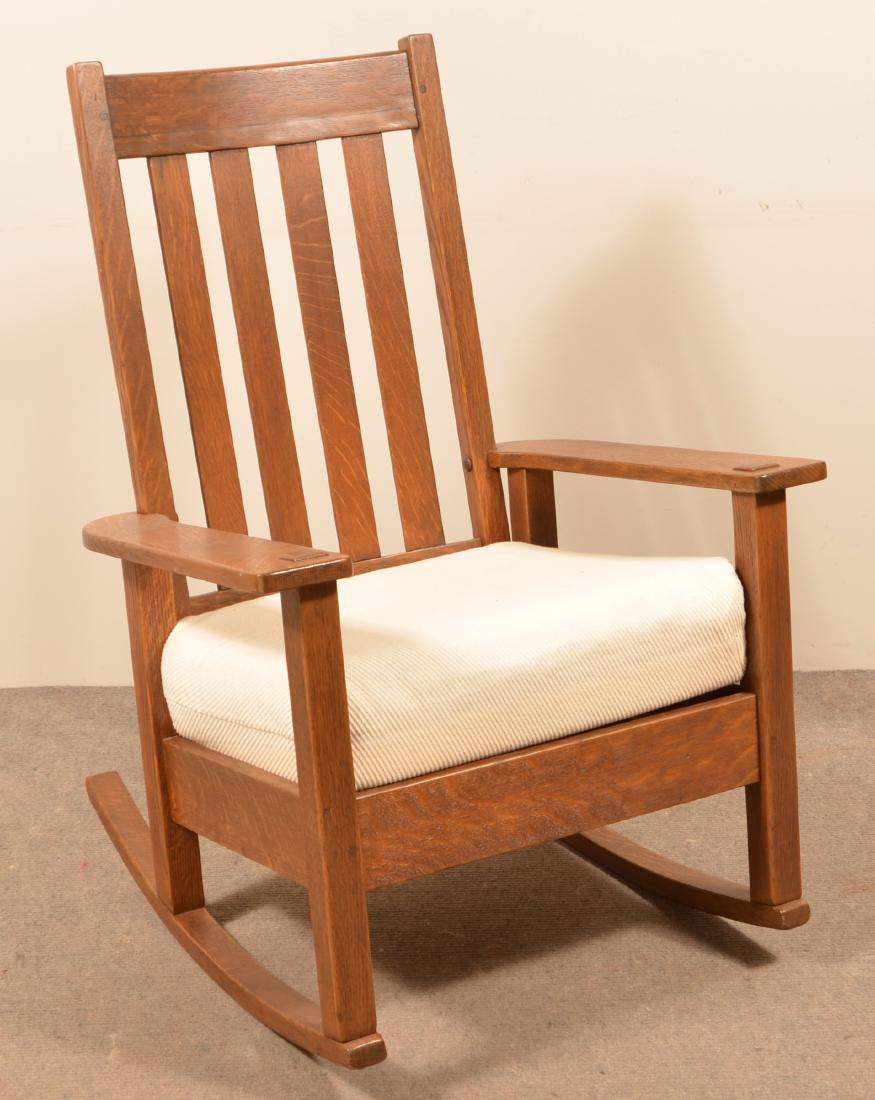 Mission oak Rocking Chair.: Mission oak Rocking Chair. Seat height 18"h.; overall 39-1/2"h. Condition: Fair with wear. Refinished.