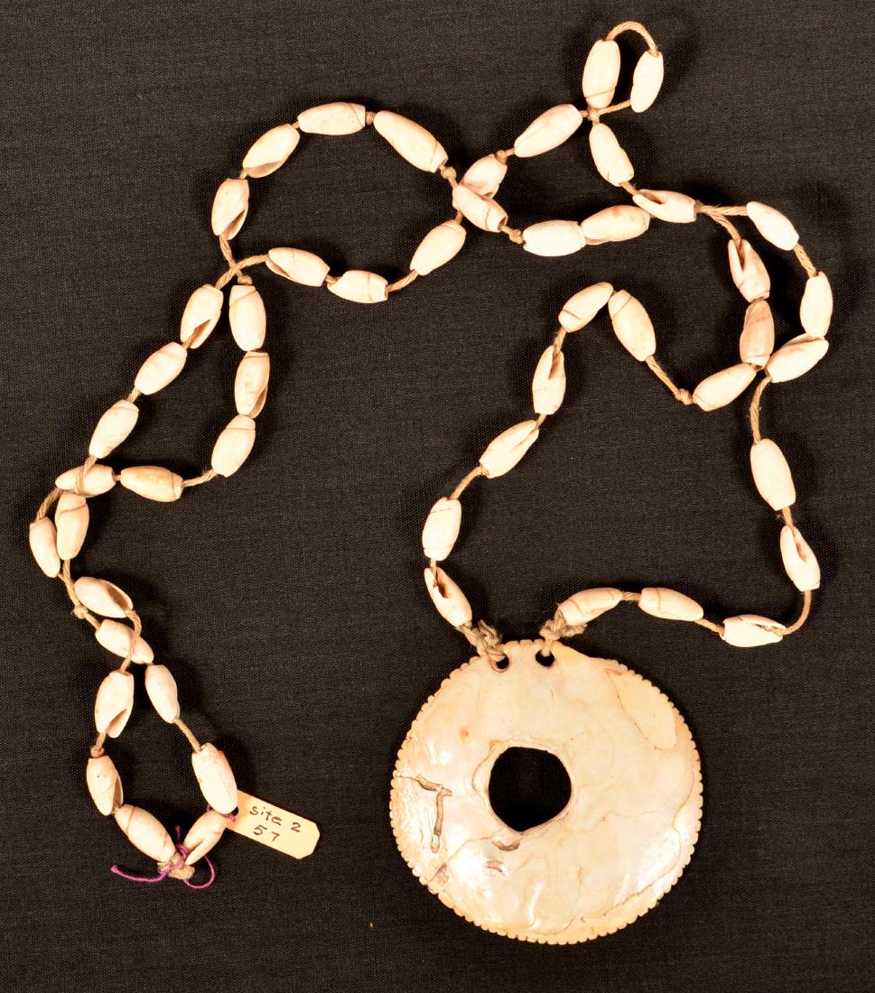Archeologically Recovered Shell Bead and Abalone Disc (1 of 3)