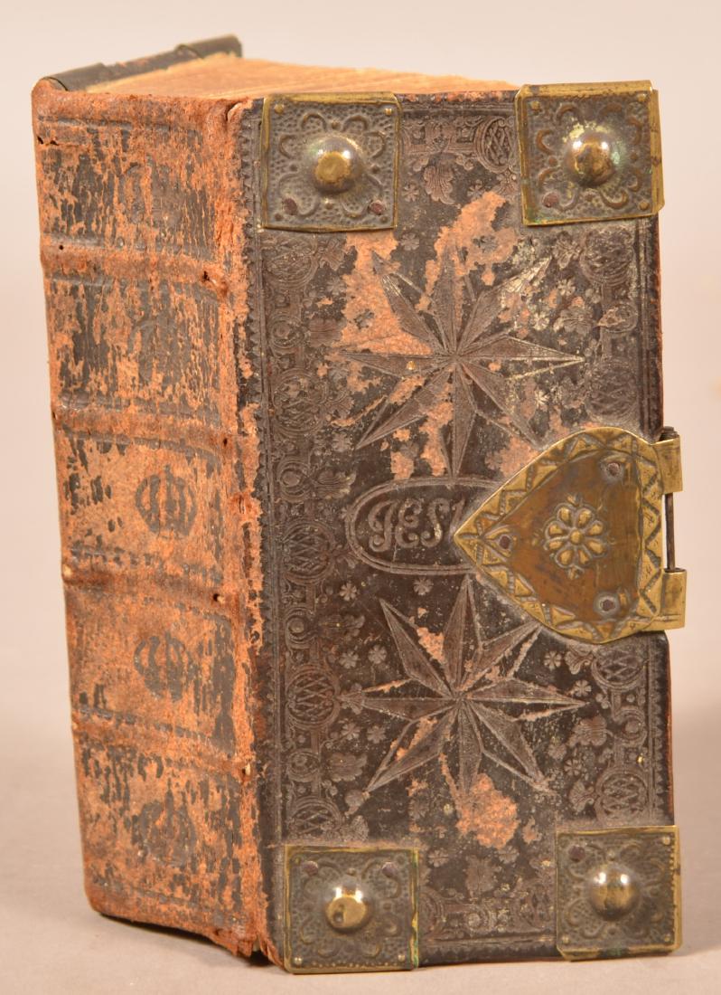 An 18th c Christian work in German, bound with brass (1 of 3)