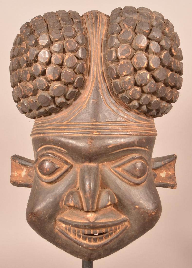 Antique/Vintage African Carved Wood Tribal Mask.: Antique/Vintage African Carved Wood Tribal Mask. Painted black and tan. 18"h. Condition: Good with wear.