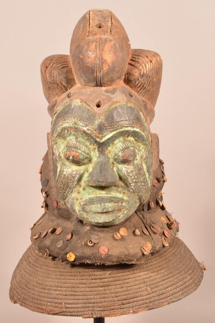 Antique/Vintage African Carved Wood Tribal Mask.: Antique/Vintage African Carved Wood Tribal Mask. Applied Metal Shells and discs. 24"h. Condition: Good with wear and losses.
