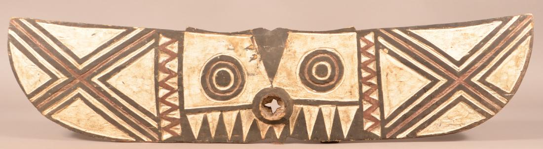 Antique/Vintage African Carved Wood Tribal Mask.: Antique/Vintage African Carved Wood Tribal Mask. Painted red, white and black. 50"w. Condition: Good with wear.