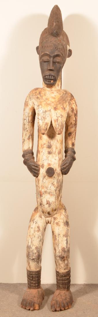 Antique/Vintage African Carved Wood Tribal Figure.: Antique/Vintage African Carved Wood Tribal Figure. 70"h. Condition: Good with wear and age cracks.