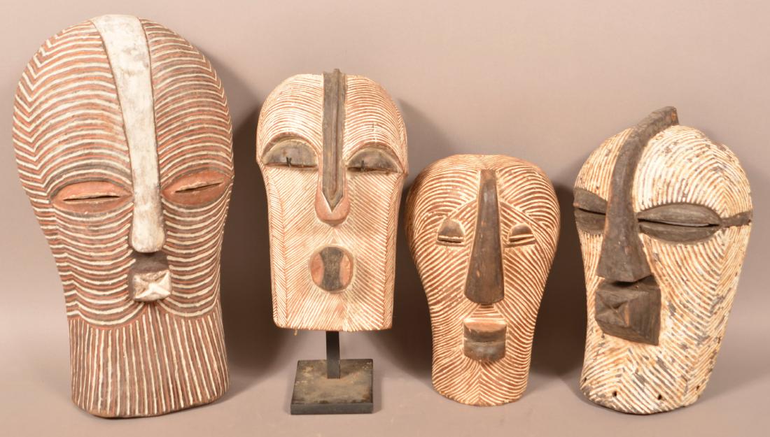 Four Antique/Vintage African Carved Wood Tribal Masks. (1 of 2)