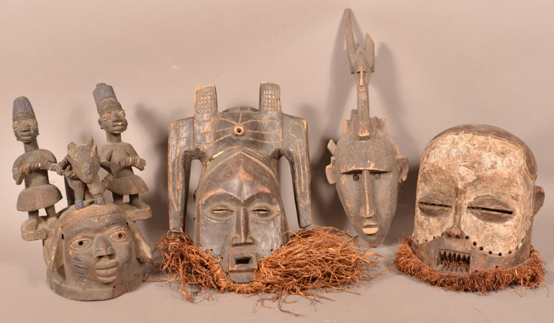 Four Antique/Vintage African Carved Wood Tribal Masks. (1 of 2)
