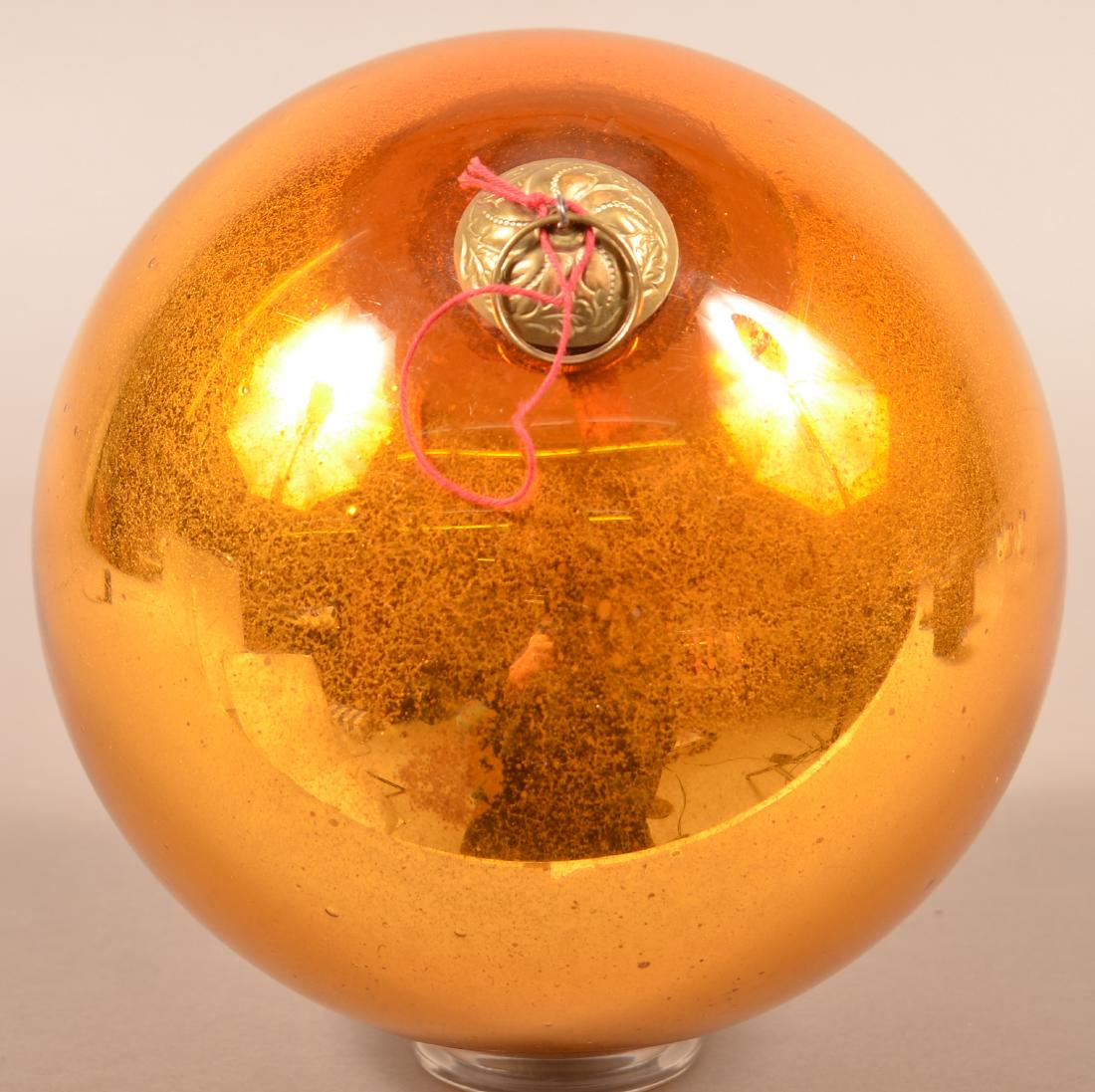 Antique German Amber Glass Ball Form Kugel. Baroque: Antique German Amber Glass Ball Form Kugel. Baroque cap. 8" diam. Condition: Very good.