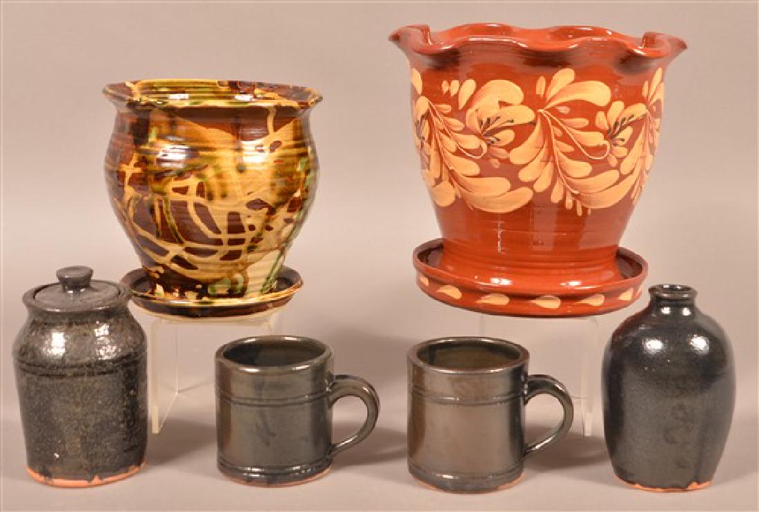 Six Pieces of B. Hughes Glazed Redware. Tallest: Six Pieces of B. Hughes Glazed Redware. Tallest measures 9-1/4"h. Condition: Very good.