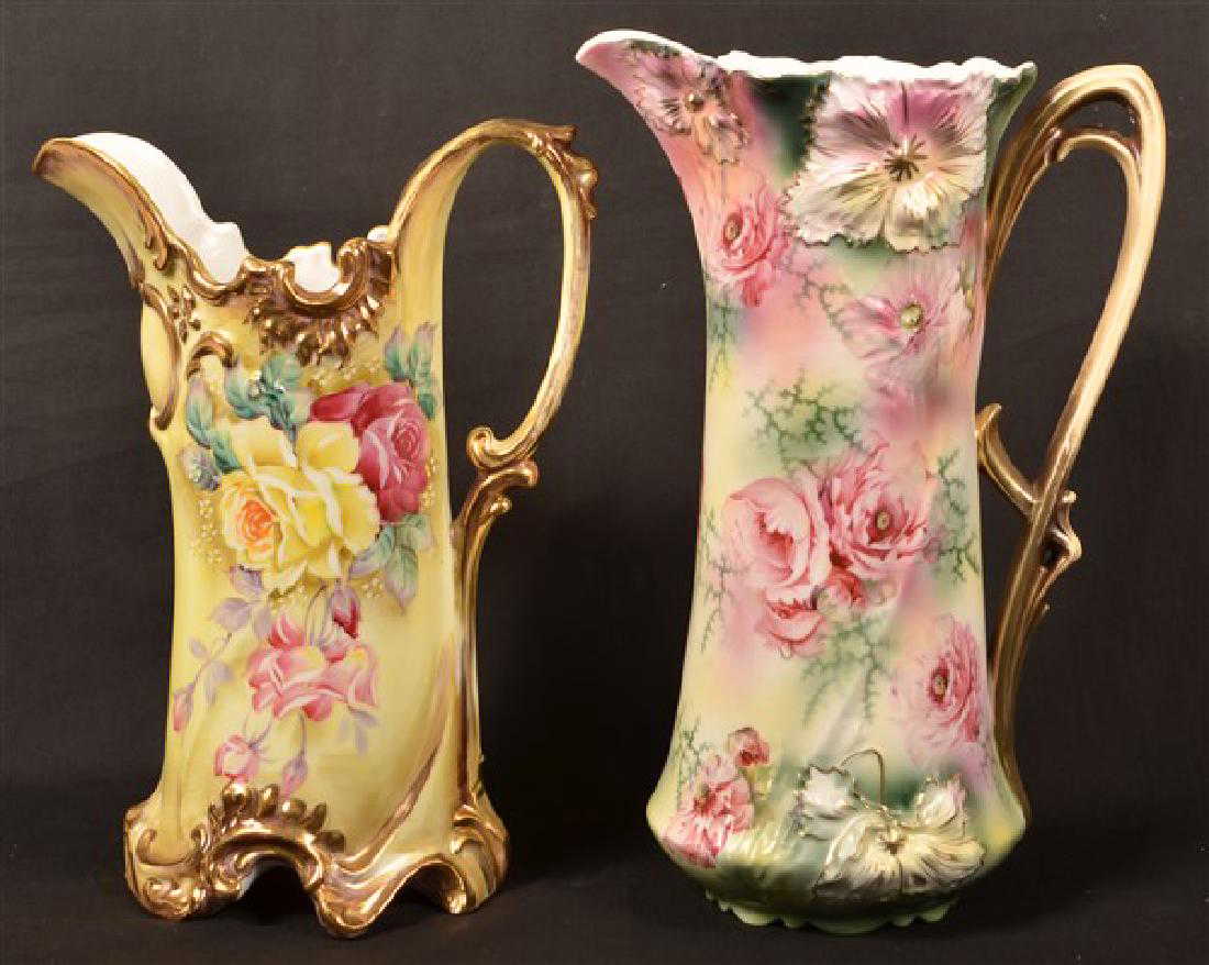Two Antique Floral Decorated Porcelain Pitchers. One RS
