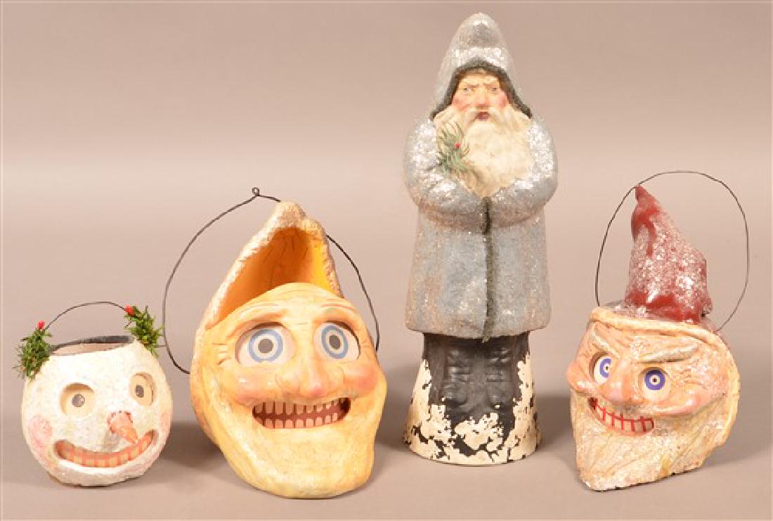 Four Contemporary folk Art Christmas: Four Contemporary folk Art Christmas Decorations/Lanterns. Mostly by Robertson. Tallest measures 11"h. Condition: Good with minor wear.