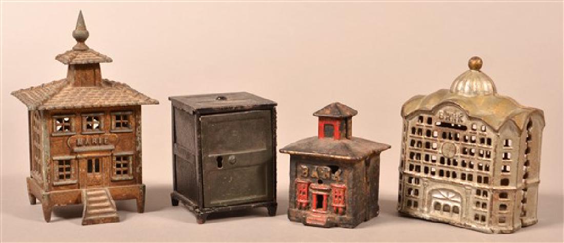 Four Various Antique/Vintage Cast Metal Still Banks. (1 of 2)