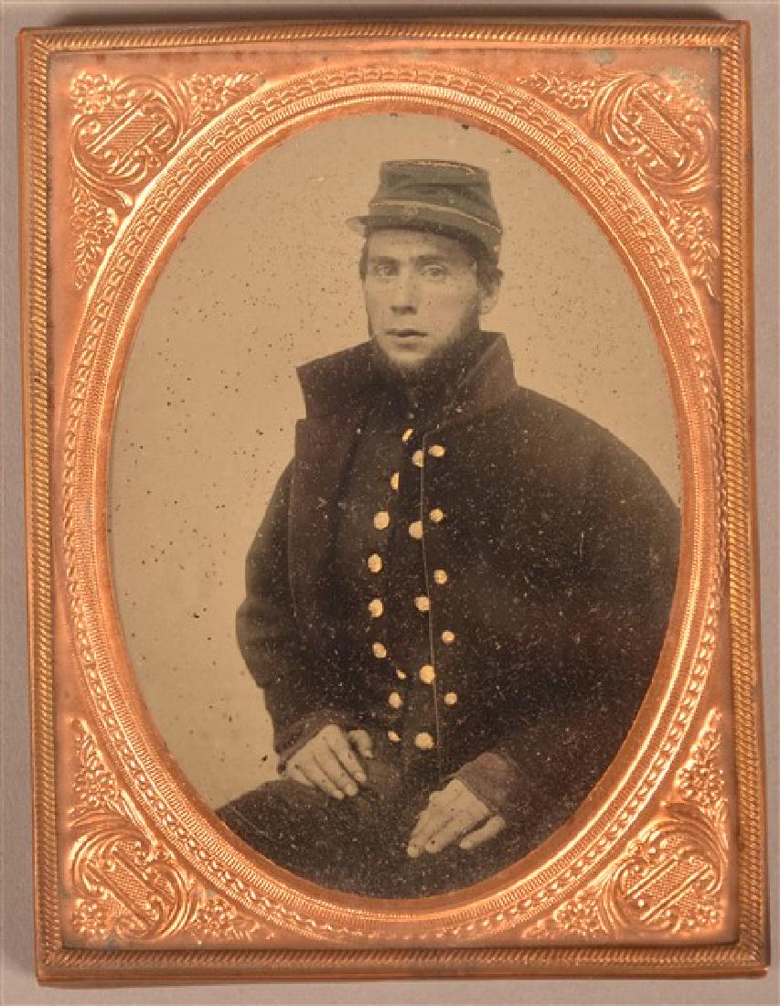 1/4 Plate Ambrotype of a Civil War Soldier. Seated pose: 1/4 Plate Ambrotype of a Civil War Soldier. Seated pose in uniform. Condition: Good with wear. No case.