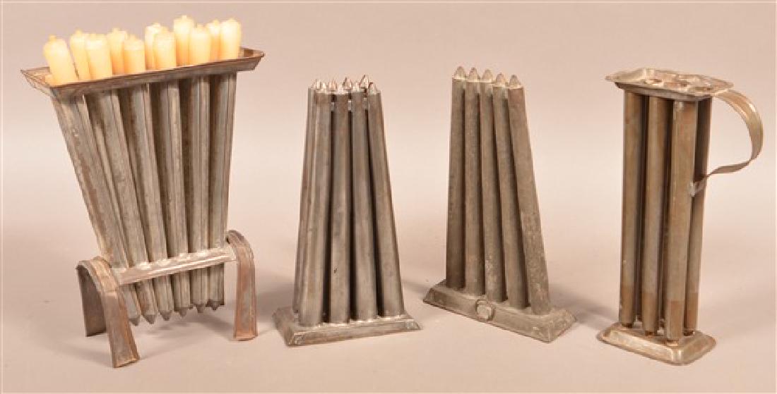 Four Various Antique Tin Candle Molds. Tallest measures (1 of 2)