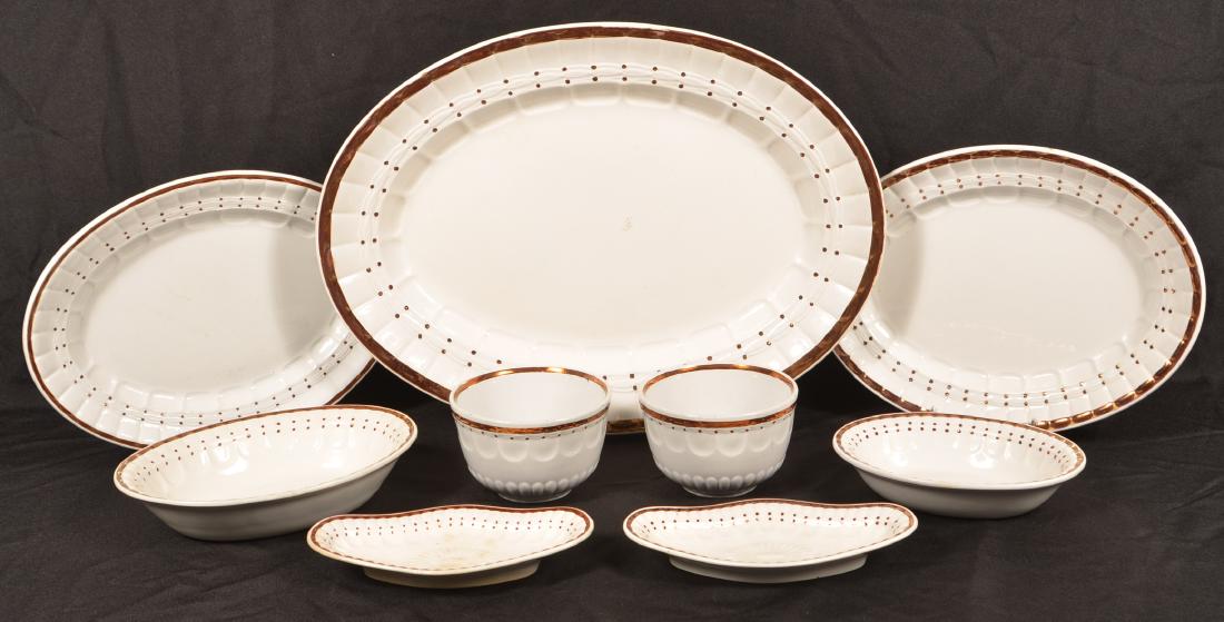 Nine Pieces of Ironstone China.: Nine Pieces of Ironstone China. Copper lustre highlights. By Elsmore and Forster. Largest platter measures 20-1/2"w. Condition: Good.