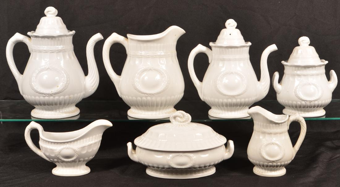 7 Pieces of Laurel Wreath White Ironstone China.: Seven Pieces of Laurel Wreath White Ironstone China. By Elsmore and Forster. Tallest measures 11"h. Condition: Good with minor stains, small chip on creamer.