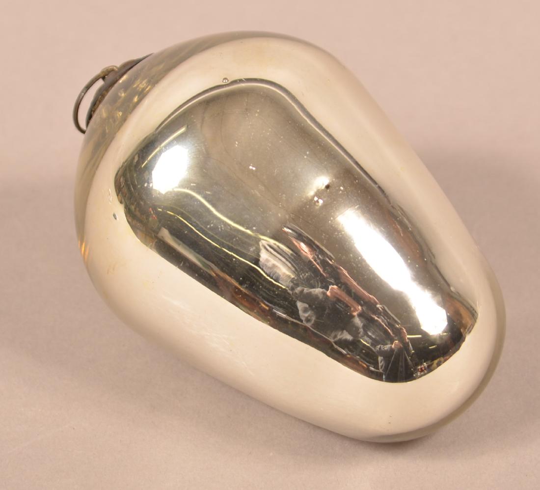 Antique German Silver Glass Egg Form Kugel.: Antique German Silver Glass Egg Form Kugel. 10 lobed cap. 3-1/2"l. Condition: Very good.
