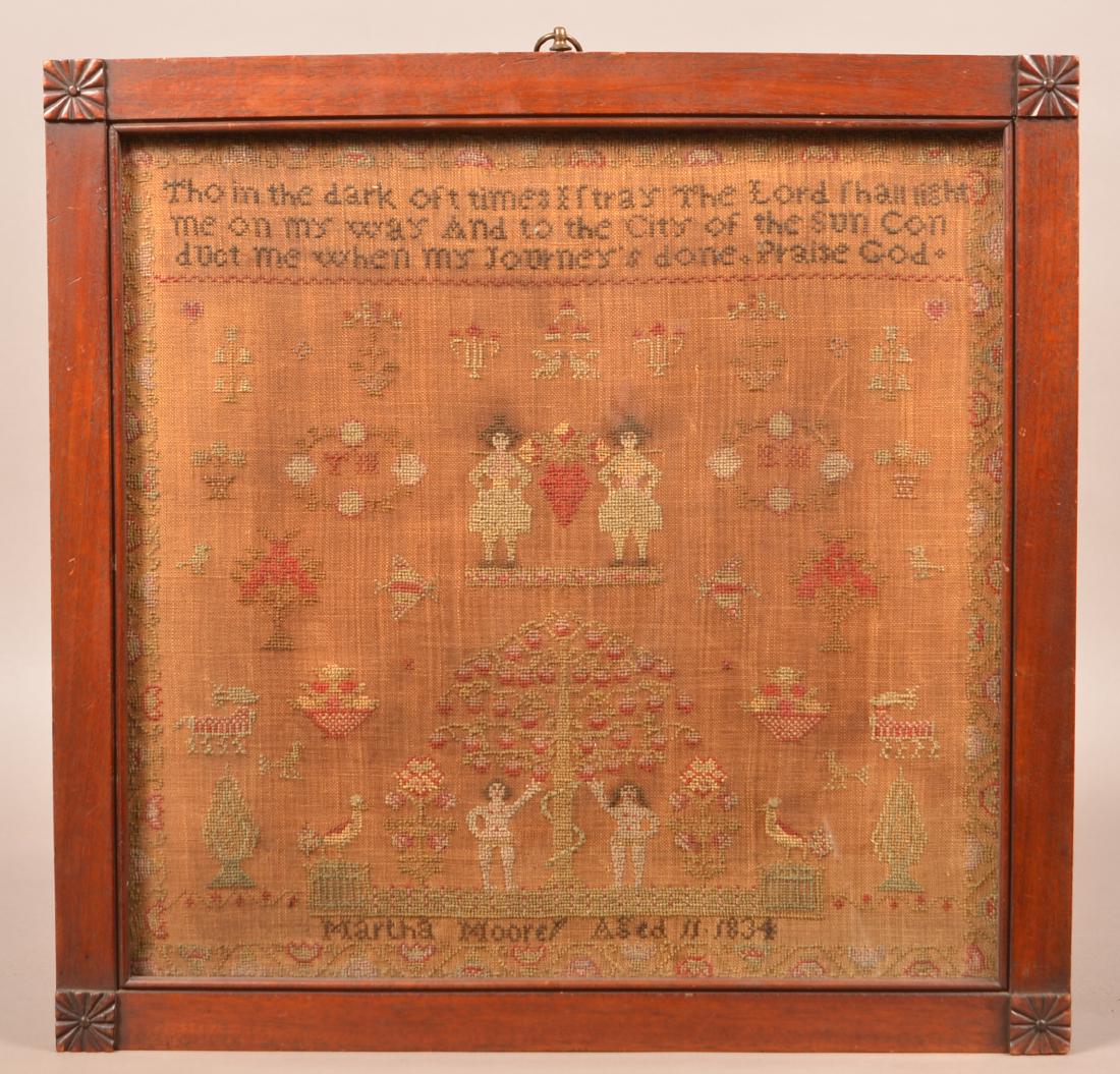 1834 Adam and Eve Needlework Sampler.: 1834 Adam and Eve Needlework Sampler. "Martha Moore, Age 11, 1834". In a period frame, 21-1/4" x 21-3/4" overall. Condition: Good with toning.
