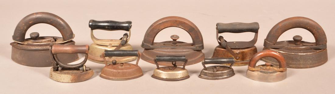 Lot of Ten Various Antique Sadirons.: Lot of Ten Various Antique Sadirons. Tallest measures 4-1/2"h. Condition: Good with use wear and scattered rust.
