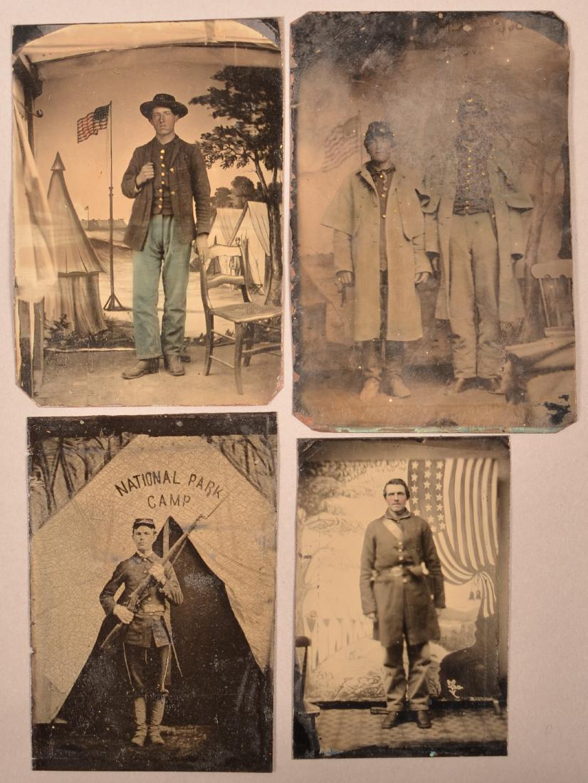 Four Tintypes of Civil War Soldiers.: Four 1/6 and 1/9 Plate Tintypes of Civil War Soldiers. All are studio poses, one is holding a rolling block with bayonet. Condition: Poor to good. No cases or frames.